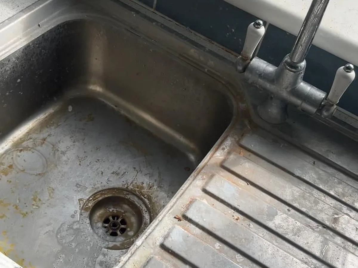Kitchen sink before cleaning